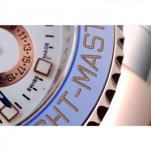 Unidirectional blue ceramic cutwork bezel with engraved rose-gold hour markers