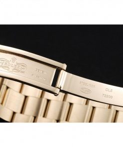 18k yellow gold plated bezel with tachymeter