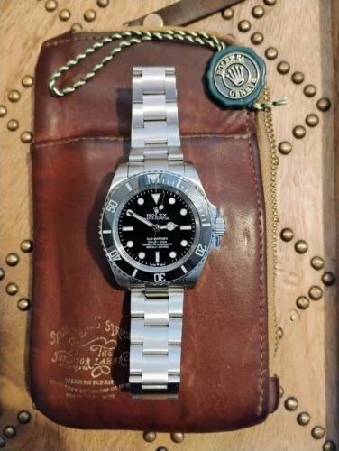 Click to view full screen Rolex Submariner 124060 No-Date photo review